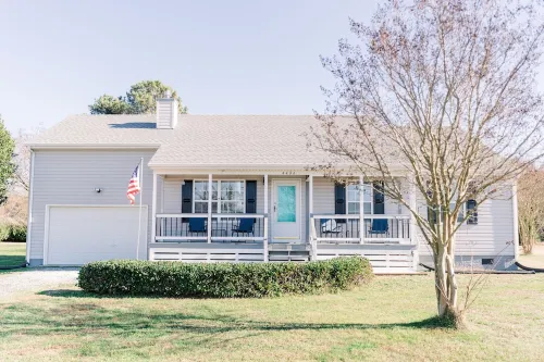 Newly Renovated, 4Bd 2 BA, 1 Full Acre, Sleeps 8, and is Pet Friendly.