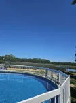 HotTub/Fish/RIVER FRONT/DOGS/SUMMER POOL.RIGHT BY GULF AND BEACHES. BRING BOAT!