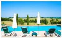 Tuscan village in SIena. farmhouse surrounded by garden,pool and panoramic view