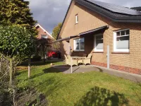 Modern vacation apartment near the North Sea with terrace and garden Hotels in Schortens