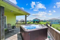 This 3 bedroom beach house is the PERFECT space to get “A Wave From It All