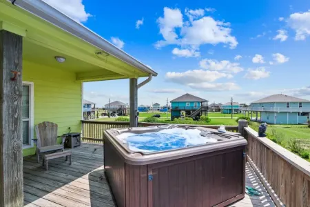 This 3 bedroom beach house is the PERFECT space to get “A Wave From It All