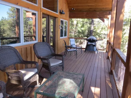Nestled-in-pines, sooth-your-soul custom home with an incredible mountain view.