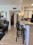 Lakeshore Village “Classic Condo” 2 patios Prime Location