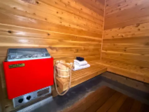 Sauna and Fireplace Retreat - Spacious Family-Friendly Haven