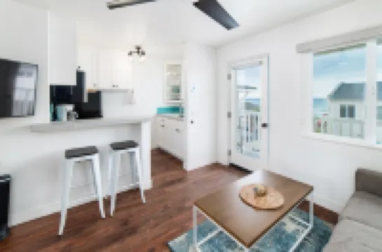 Ocean View Balcony and Vintage Fireplace - Charming Coastal Retreat