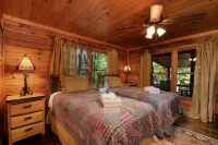 Secluded Cabin by Big Creek with Hot Tub - Cozy Rustic Retreat