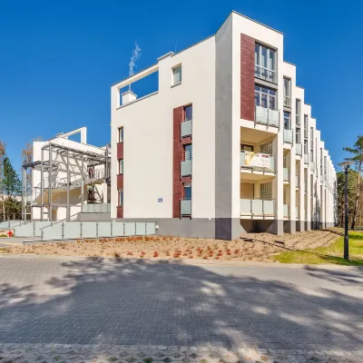 Apartamenty Sun&Snow Bursztynowe Osiedle Отели рядом с достопримечательностью «Остров Собешево»