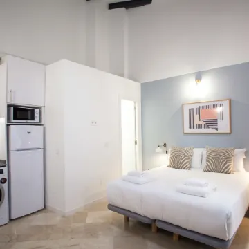 Gran Central Suites Отели рядом с достопримечательностью «Небоскреб "Испания"»
