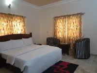 Grace Garden Apartments Hotels near Living Faith Church Eket