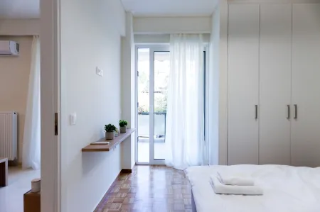 Modern 2-bedroom Apartment in Downtown Glyfada Отели в г. Глифада