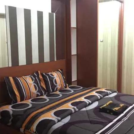 Lina Room at Apartemen Green Lake View