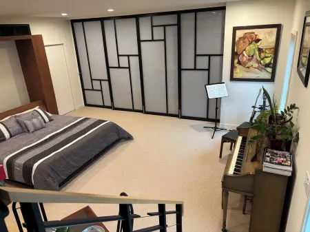 Lux Loft Plus Near IU, Sustainable, Custom Private Apartment + EV Charger