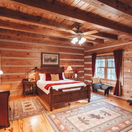 Modern luxury 4 Bedroom cabin with game room, hot tub, sauna and home theater