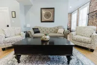 5 min to Arch, Dome, Stadium, 2 BR 2 BA Sleeps 5, Historical exposed Brick Loft