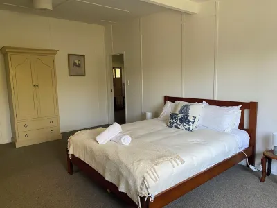 Close to the river, 11 TeAho  is a family lodge with plenty of character Hotels near Lake Taupo