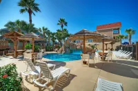 Private Yard Cornhole Resort Pool Oasis w Slide down the Shore by AvantStay
