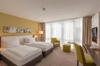 Holiday Inn Munich - Unterhaching فنادق في Oberhaching