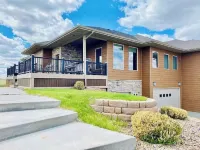 Large Bayside Golf Course home with Lake Views.