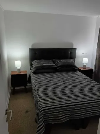 Charming 2-bedroom apartment with WiFi and fitness room in vibrant Santiago