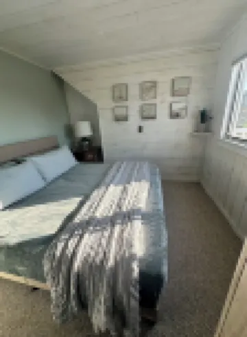 Short walk to the beach! See & hear the ocean in the distance. Great living area