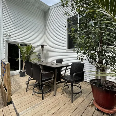 Contemporary home in quiet neighborhood with pool & great back yard close to all