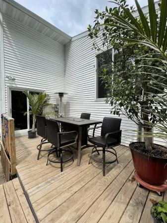 Contemporary home in quiet neighborhood with pool & great back yard close to all