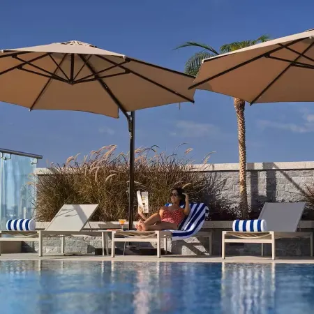 Vogue | Novotel Jvt Near Springs Souk Mall Отели рядом с достопримечательностью «Комплекс Дубай-Студио-Сити»