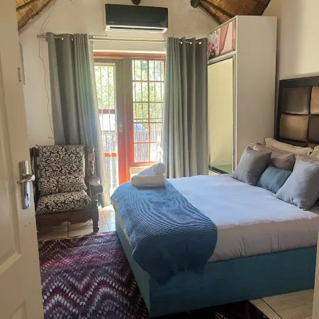Serene Thatched Roof Retreat in Faerie Glen, Pretoria