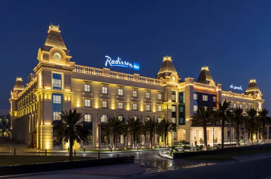 Radisson Blu Hotel Ajman Hotels near Qasar Al Madina Mobile Phone