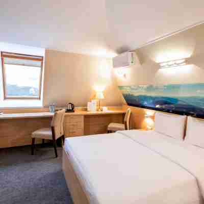 Aura Aquarelle Hotel Rooms