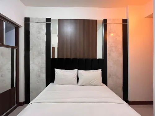 Warm and Cozy 2BR Vida View Makassar Apartment By Travelio