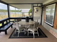 Completely renovated mobile home sitting own a pond. Hotels near Lowe's Garden Center