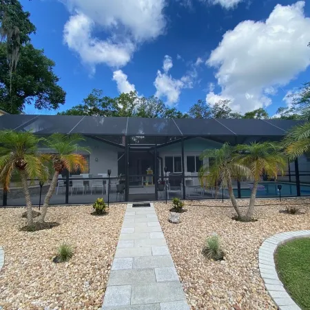 Waterfront Paradise w dock, large patio, lanai, pool, hot tub! Bring your boat!