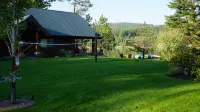 Waterfront Log Home | Private Dock | Expansive Beautiful Yard and Gardens - 4-Star