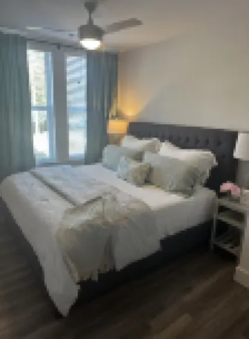 Walk to the square and the grove! This 2BR 2BA is the perfect location.