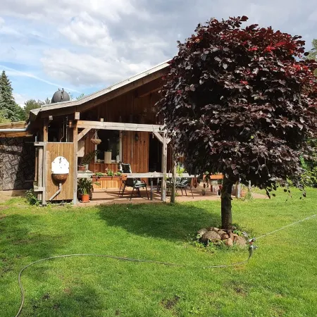 lovingly furnished cottage with terrace in the countryside