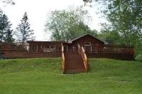 Spectacular Catskill Mountain River Front Custom Log Home