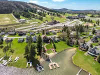 Lake Front Home w/ Hot Tub, Fire pit, yard, walk to Wisp Resort,Tubing Hill View