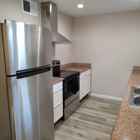 Centrally located close to everything with private entry and private yard.