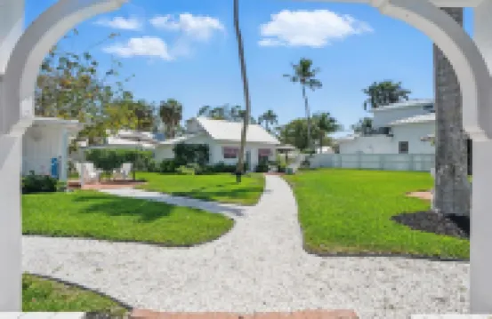 The Historic Coquina Cottages C is 2 Blocks to the Beach, 5th Avenue and 3rd St.