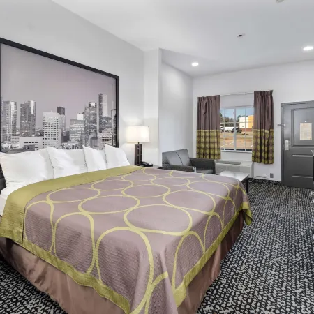 Super 8 by Wyndham Carthage TX Отели в г. Панола