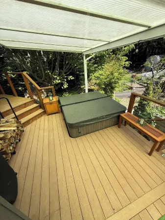 Modern studio with hot tub and patio access