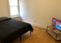 Spacious 2 Bedroom Apartment with 1 Bathroom and Private Street Entrance Hotels near Roberto Clemente Park