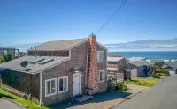Cozy Cottage with Expansive Deck - Charming Ocean View Retreat