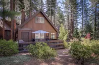 Forest-view cabin with woodstove & furnished deck - walk to golf course