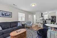 Cozy Living Area and Modern Kitchen Amenities - Charming Retreat