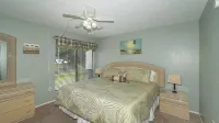 Waterfront Patio and Fully Equipped Kitchen - Vibrant Coastal Retreat
