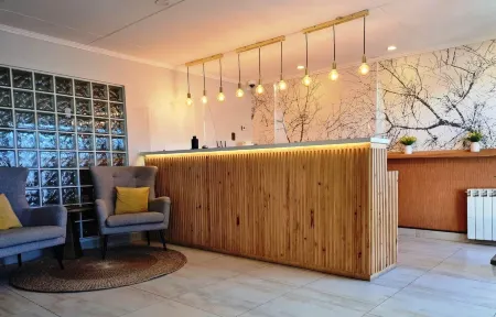 Hotel Carpa Manzano Отели в г. Магальянес