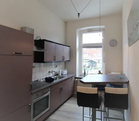 Cozy vacation apartment with garden use Отели в г. Шверин